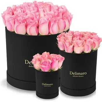 Pink roses in a black box