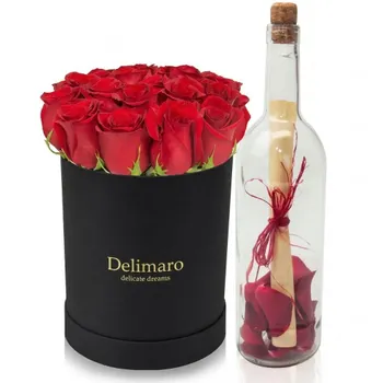 Flowerbox with letter in a bottle
